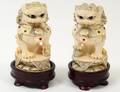 PAIR OF CARVED JEWELED IVORY FU DOGS