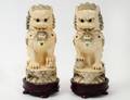 PAIR OF CARVED JEWELED IVORY FU DOGS