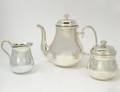 THREE PIECE CHRISTOFLE SILVER PLATED TEA SERVICE