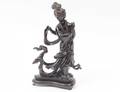 MOLDED AMBER FIGURE OF GUANYIN