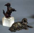 14 TWO PATINATED BRONZE FIGURES OF DOGS