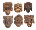 GROUP OF SIX CARVED WOODEN MASKS