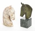 TWO HORSE HEADS ONE BRONZE AND ONE STONE