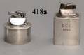 418A Pair of Weighted Sterling Silver Cigarette Lighte