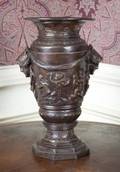 METAL URN WITH PUTTI