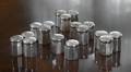 GROUP OF SEVENTEEN METAL SALT AND PEPPER SHAKERS