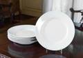 SET OF SIX WHITE CERAMIC DISHES