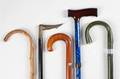 GROUP OF FIVE WALKING CANES