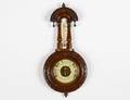 CARVED OAK BAROMETERTHERMOMETER