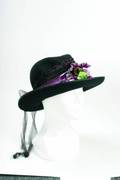 A BOB MACKIE HAT WITH FLOWERS