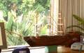 A WOODEN MODEL THREEMASTED SHIP