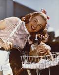 MARILYN MONROE WITH BOXER PUPPY BY ANDRE DE DIENES