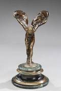 A BRONZE STATUE OF A WINGED FEMALE