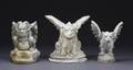 AN ASSEMBLED GROUP OF GARGOYLE GARDEN STATUES