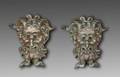 A PAIR OF CAST BRONZE SATYR HEADS