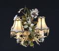 A VINTAGE POLYCHROME FOUR LIGHT CHANDELIER