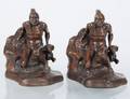 PAIR OF PATINATED METAL BOOKENDS