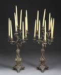 A PAIR OF ROCOCO REVIVAL NINE LIGHT CANDELABRA