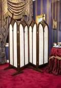 A PAIR OF GOTHIC STYLE CARVED SCREENS