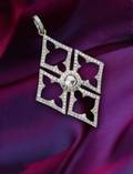AN 18K WHITE GOLD AND DIAMOND PENDANT