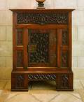 A GERMAN GOTHIC REVIVAL OAK CUPBOARD