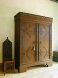 A GOTHIC REVIVAL OAK ARMOIRE