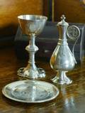 A VICTORIAN SILVER COMMUNION SET