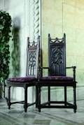 SEVEN GOTHIC REVIVAL OAK DINING CHAIRS