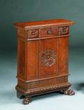 AN ITALIAN BAROQUE STYLE SIDE CABINET