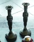 A PAIR EGYPTIAN REVIVAL OF CANDLESTICKS