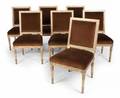 EVANDER HOLYFIELD SET OF SEVEN NEOCLASSICAL STYLE DINING CHAIRS