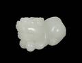 WHITE JADE FIGURE OF A FU LION