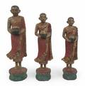GROUP OF THAI PAINTED AND GILTWOOD STATUES