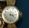 66 FOURTEEN KARAT YELLOW GOLD OMEGA LADYS WRISTWATCH