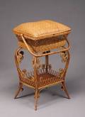 A HEYWOODWAKEFIELD STYLE WICKER SEWING TABLE