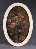 A DECORATIVE OVAL FLORAL STILL LIFE PAINTING