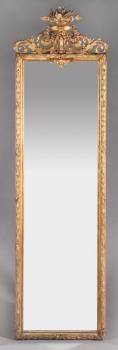 A CARVED AND GILDED PIER MIRROR