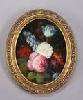 AN OVAL STILL LIFE PAINTING