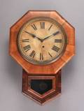 AN OCTAGONAL ANSONIA WALL CLOCK