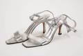 SILVER SHOES WORN BY PLAYBOY COVER MODEL