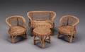 AN ANTIQUE WICKER CHILDS SET
