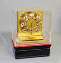 70 BRASS ENAMEL GLASS AND WOOD MANTEL CLOCK
