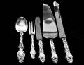 152 GROUP OF FIVE STERLING SILVER FLATWARE PIECES