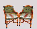 146 SET OF FOUR RATTAN AND WICKER ARM CHAIRS