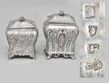 387 TWO GEORGE III STERLING SILVER TEA CADDIES
