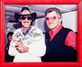 BURT REYNOLDS RICHARD PETTY SIGNED AND INSCRIBED PHOTOGRAPH