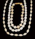 417 GROUP OF THREE IVORY BEAD NECKLACES