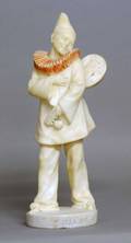 88 ALABASTER FIGURE OF A HARLEQUIN