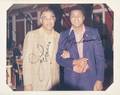 MUHAMMAD ALI AND JOE LOUIS SIGNED CANDID PHOTOGRAPH FROM CAESARS PALACE