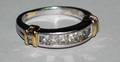 180 PLATINUM AND EIGHTEEN KARAT GOLD DIAMOND BAND